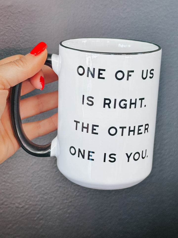 One Of Us Is Right Coffee Mug